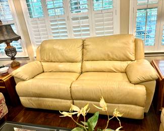 Leather reclining love seat