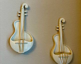 Pair of vintage ceramic cello wall hangings