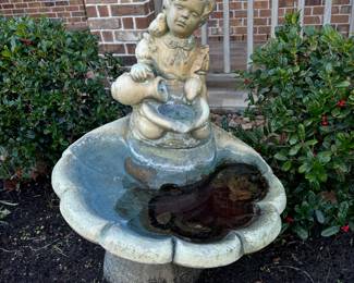 Girl with watering can fountain