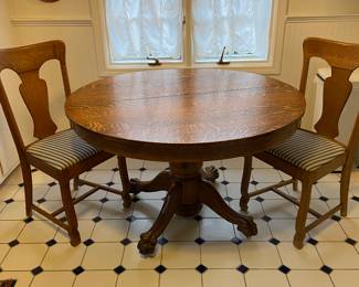 Antique Round Oak Table and like everything else in this house, immaculate