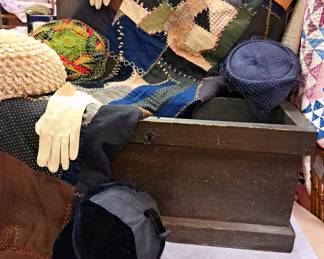 Much collectibles.  Vintage hats and quilts