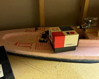 Vintage boat and multiple motors 