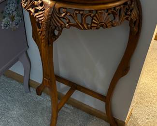 Hand carved side table with marble accent