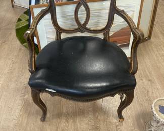 Ribbon back chair with leather