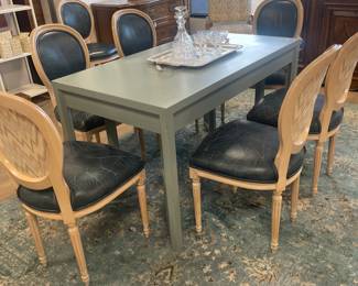 8 leather dining chairs. 6 side and 2 arm