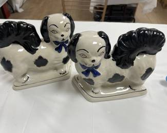 Unusual pair of Staffordshire style dogs