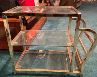 18 x 20 gold and glass end table with attached magazine rack
