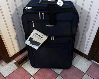 28" x 18" Moda Suitcase - tags still on