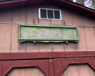 Outdoor sign "Tools Toys Mahoo"