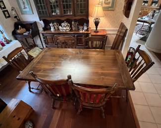 Solid wood table with 2 leaves (has 6 chairs)