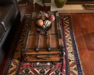 Steamer trunk and area rug