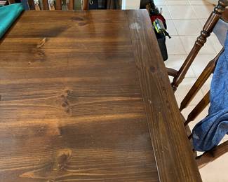 Solid wood table with 2 leaves (has 6 chairs)