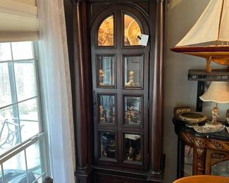 Tall curio cabinet