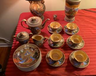 Japanese tea set, cups and saucers, dessert plates, lamp, and vases
