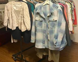 Lots of women's clothes with names like Anthropology, Madewell, Banana Republic, Platinum, J Crew, Tahari, Beret...