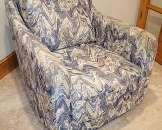 Pair of VERY well made upholstered swivel armchairs. Fabric is shimmery