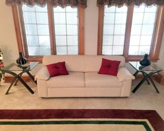 White leather sleeper sofa...