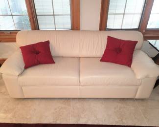 White leather sleeper sofa...
