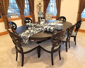 Stunning Arhaus 60" round table that extends to 12'!! (Dark chocolate/black)