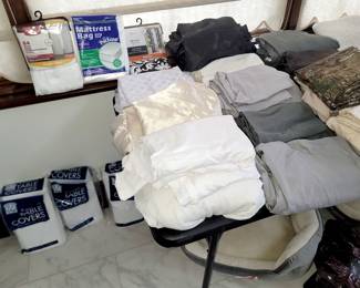 Bed linens. Shower curtains