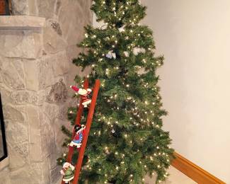 Lighted Christmas tree. Branch sections connect electrically so no cords to connect!