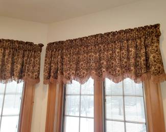 11 windows of curtains that all match