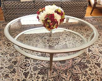 Oval beveled glass and metal coffee table