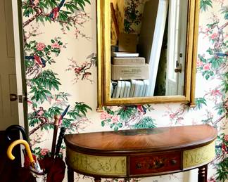 Vintage wall mirror, vintage half-moon table, blue & white umbrella stand, vintage umbrellas and canes