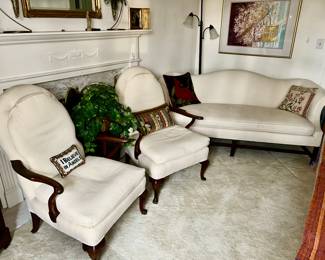 Vintage chairs and camel back sofa with single cushion
