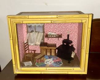 Close-up of diorama in glass/bamboo case/box