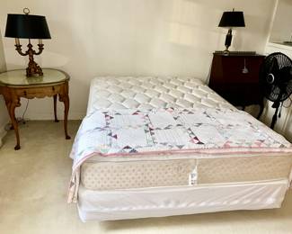 Queen size bed, vintage quilt, Vintage table with custom glass protective top, Queen Anne legs, lamps