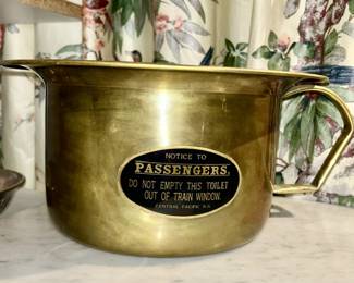 Close-up view of antique brass chamber pot with Central Pacific RR label and instructions!