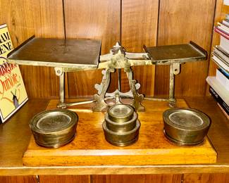 Antique brass postal scale with weights on wooden stand