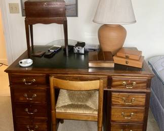 vintage desk with leather top, chair, wooden box on stand, large table lamp, jewelry boxes, card box, etc.