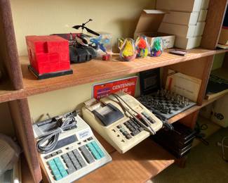 Adding machines, chess, paperweights