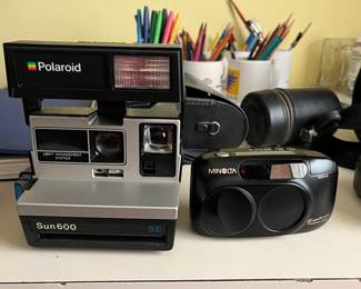 Polaroid Sun 600 Camera, Minolta Explorer Freedom Zoom Camera