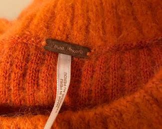 Dozens of Free People sweaters!