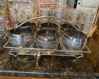 Adorable barware sets with carriers.