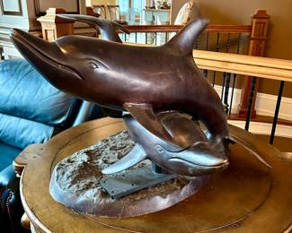 Bronze dolphin sculpture