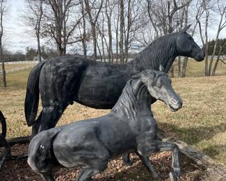 Made of some of metal (galvanized?) horse (approx 5’6” tall by 6’ long)
pony (approx 4’6” by 5’ long )