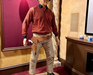 John Wayne composite sculpture with fabric clothing, 76" tall with stand