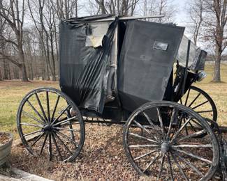 Buggy is in rough shape but the wheels can be salvaged