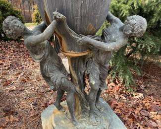 metal & cast stone planter 46" by 33" by 25" (stone planter "as is")