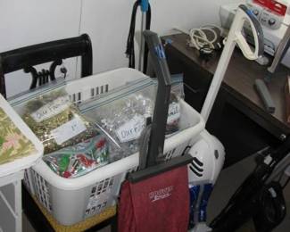 Basket full of garland, another shot of the vacuums, the one on the right is actually a carpet cleaner