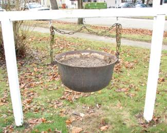 Large cast iron cauldron, you must take the dirt with it, there is no place to dump it.