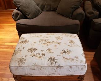 UPHOLSTERED ARMCHAIR AND OTTOMAN