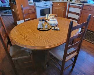 Kitchen table. 4 ladder back chairs 
