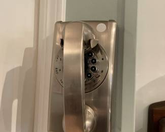 silver wall phone definitely a classic