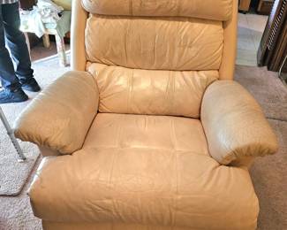 another groovy recliner with cream color leather