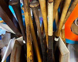 Used game baseball  bats 